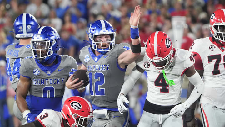 Kentucky’s Brock Vandagriff runs for a first down against Georgia Saturday night.
Sept. 14, 2024