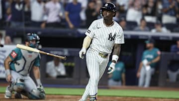 Jul 9, 2025; Bronx, New York, USA;  New York Yankees second baseman Jazz Chisholm Jr. (13) hits a two run home run in the fifth inning against the Seattle Mariners at Yankee Stadium. Mandatory Credit: Wendell Cruz-Imagn Images