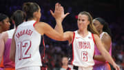 Team USA guard Sabrina Ionescu high-fives teammate Diana Taurasi as they play against Team WNBA in the WNBA All-Star Game