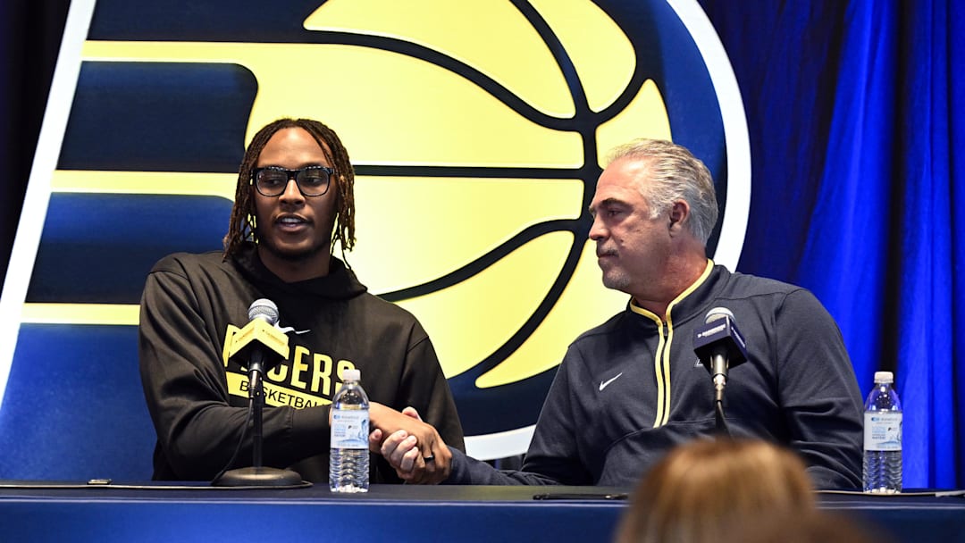 Jan 30, 2023; Indianapolis, IN, USA; Indiana Pacers center Miles Turner shakes the hand of the President of Basketball operations Kevin Pritchard during a press conference to announce his contract extension at Gainsbridge Fieldhouse. Mandatory Credit: Marc Lebryk-Imagn Images Jan 30, 2023; Indianapolis, IN, USA; Indiana Pacers center Miles Turner shakes the hand of the President of Basketball operations Kevin Pritchard during a press conference to announce his contract extension at Gainsbridge Fieldhouse. Mandatory Credit: Marc Lebryk-Imagn Images