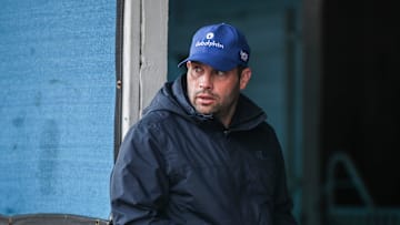 Trainer Brad Cox working at his stable on April 17, 2024. The Louisville native has two contenders for the Kentucky Derby in Louisiana Derby winner Catching Freedom and Blue Grass Stakes runner-up Just a Touch. Encino, winner of April 13, 2024 Grade 3 Lexington Stakes at Keeneland, could be a third contender.