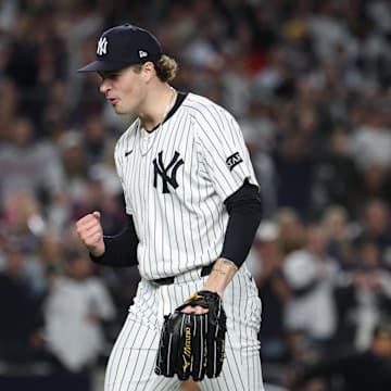 Oct 2, 2025; Bronx, New York, USA; New York Yankees pitcher Cam Schlittler (31) pumps his fist as he leaves the field after pitching the eighth inning against the Boston Red Sox during game three of the Wildcard round for the 2025 MLB playoffs at Yankee Stadium. Mandatory Credit: Vincent Carchietta-Imagn Images