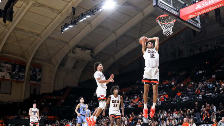 Oregon State's Michael Rataj (12) goes up for a slam dunk during the men   s basketball game against Bushnell on Tuesday, Nov. 15, 2022 at OSU in Corvallis, Ore.

Osuvsbushnell127