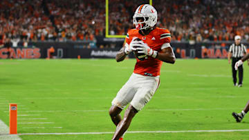 Sep 27, 2024; Miami Gardens, Florida, USA; Miami Hurricanes wide receiver Isaiah Horton (2) scores a touchdown against the Virginia Tech Hokies during the fourth quarter at Hard Rock Stadium. Mandatory Credit: Sam Navarro-Imagn Images