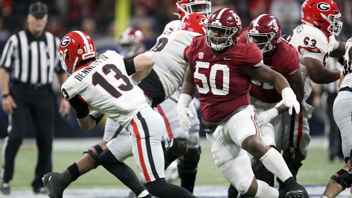 Dec 4, 2021; Atlanta, GA, USA; Alabama Crimson Tide defensive lineman Tim Smith (50) pressures Georgia Bulldogs quarterback Stetson Bennett (13) during the SEC championship game at Mercedes-Benz Stadium. Alabama won 41-24. Mandatory Credit: Gary Cosby Jr.-Imagn Images