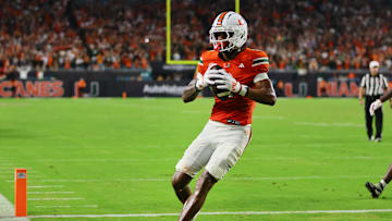 Sep 27, 2024; Miami Gardens, Florida, USA; Miami Hurricanes wide receiver Isaiah Horton (2) scores a touchdown against the Virginia Tech Hokies during the fourth quarter at Hard Rock Stadium. Mandatory Credit: Sam Navarro-Imagn Images