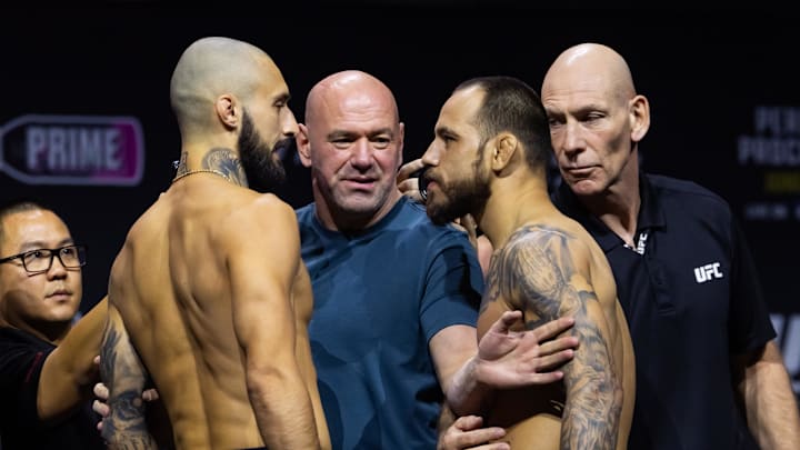 Jun 28, 2024; Las Vegas, Nevada, USA; Dana White (center) separates Charles Jourdain (left) from Jean Silva as they face off during weigh ins for UFC 303 at T-Mobile Arena. Mandatory Credit: Mark J. Rebilas-Imagn Images Jun 28, 2024; Las Vegas, Nevada, USA; Dana White (center) separates Charles Jourdain (left) from Jean Silva as they face off during weigh ins for UFC 303 at T-Mobile Arena. Mandatory Credit: Mark J. Rebilas-Imagn Images