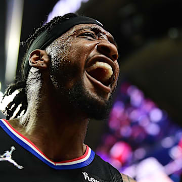 Apr 15, 2022; Los Angeles, California, USA; Los Angeles Clippers forward Robert Covington (23) reacts after scoring a basket and drawing the foul against the New Orleans Pelicans during the second half of the play in game at Crypto.com Arena. Mandatory Credit: Gary A. Vasquez-Imagn Images