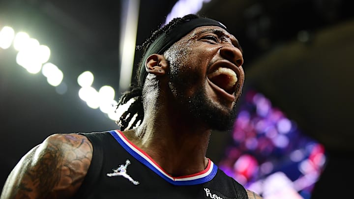 Apr 15, 2022; Los Angeles, California, USA; Los Angeles Clippers forward Robert Covington (23) reacts after scoring a basket and drawing the foul against the New Orleans Pelicans during the second half of the play in game at Crypto.com Arena. Mandatory Credit: Gary A. Vasquez-Imagn Images