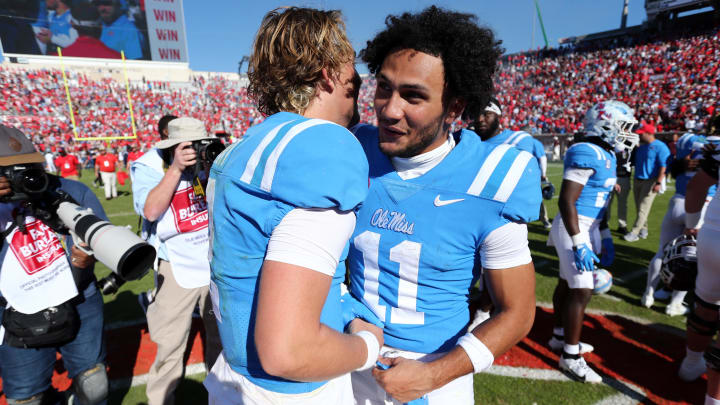 Nov 4, 2023; Oxford, Mississippi, USA; Mississippi Rebels quarterback Jaxson Dart (2) and wide receiver Jordan Watkins (11) react after defeating the Texas A&M Aggies at Vaught-Hemingway Stadium. Mandatory Credit: Petre Thomas-USA TODAY Sports