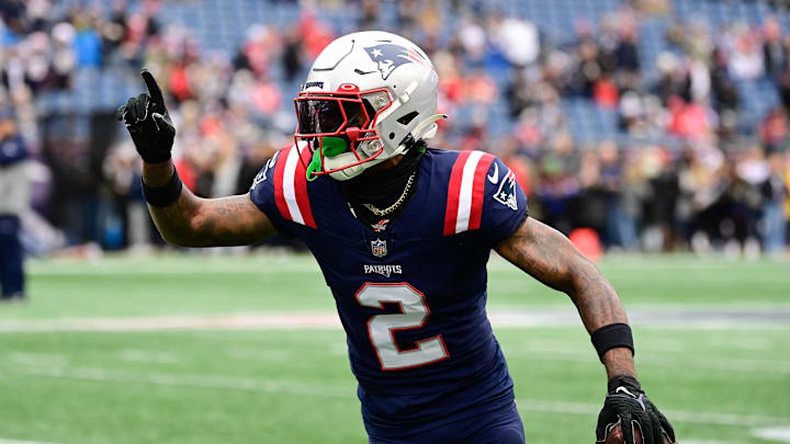 Dec 17, 2023; Foxborough, Massachusetts, USA; New England Patriots cornerback Jalen Mills (2) warms up before a game against the Kansas City Chiefs at Gillette Stadium. Mandatory Credit: Eric Canha-Imagn Images