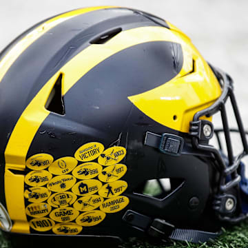 A Michigan football helmet on the field during warmup at the spring game at Michigan Stadium in Ann Arbor on Saturday, April 20, 2024.