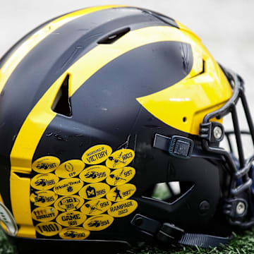 A Michigan football helmet on the field during warmup at the spring game at Michigan Stadium in Ann Arbor on Saturday, April 20, 2024.