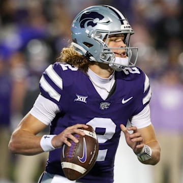 Oct 26, 2024; Manhattan, Kansas, USA; Kansas State Wildcats quarterback Avery Johnson (2) drops back to pass during the third quarter against the Kansas Jayhawks at Bill Snyder Family Football Stadium.