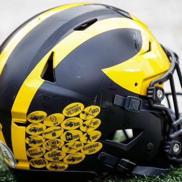 A Michigan football helmet on the field during warmup at the spring game at Michigan Stadium in Ann Arbor on Saturday, April 20, 2024.