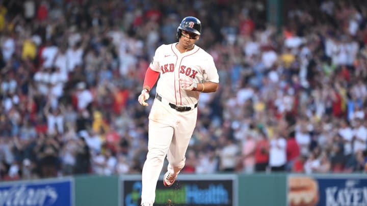 Boston Red Sox third baseman Rafael Devers (11) runs the bases after hitting a two-run home run against the Seattle Mariners during the third inning at Fenway Park on July 30.