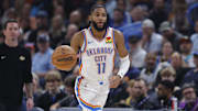 Nov 12, 2025; Oklahoma City, Oklahoma, USA; Oklahoma City Thunder guard Isaiah Joe (11) dribbles down the court against the Los Angeles Lakers during the second quarter at Paycom Center. Mandatory Credit: Alonzo Adams-Imagn Images