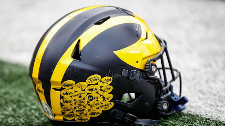 A Michigan football helmet on the field during warmup at the spring game at Michigan Stadium in Ann Arbor on Saturday, April 20, 2024.