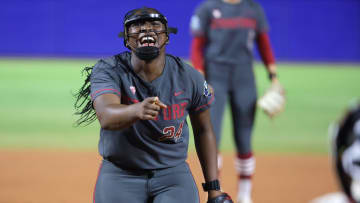 Stanford's NiJaree Canady (24) celebrates during a Women's College World Series softball game between the Stanford Cardinal and the UCLA Bruins at Devon Park in Oklahoma City.