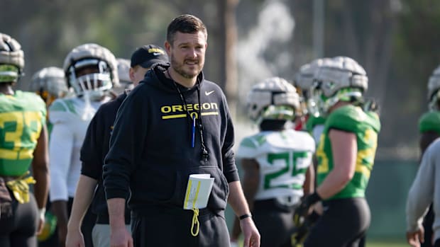 Oregon head coach Dan Lanning walks the field during open practice for the Oregon Ducks at the Dignity Health Sports Park in 