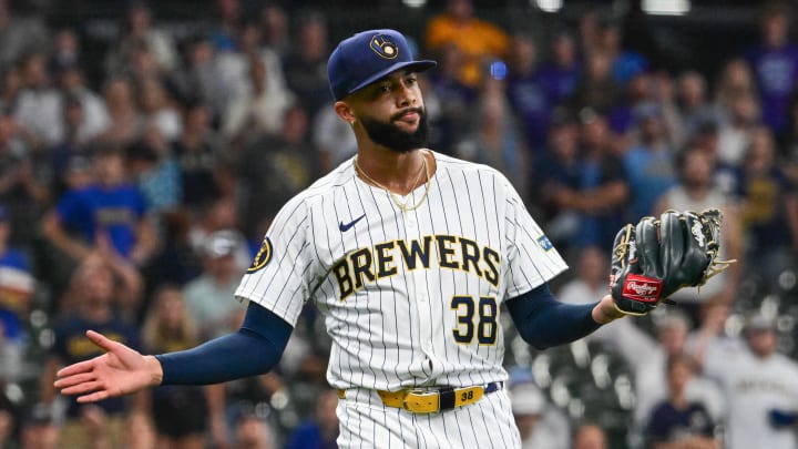 Jul 28, 2024; Milwaukee, Wisconsin, USA; Milwaukee Brewers relief pitch Devin Williams (38) reacts after pitching in the ninth inning against the Miami Marlins in his first game back from the injured list this year at American Family Field. Mandatory Credit: Benny Sieu-USA TODAY Sports