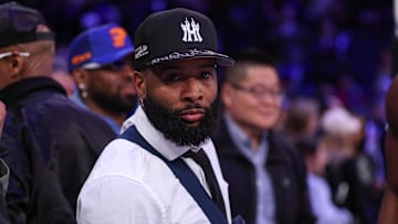 NFL wide receiver Odell Beckham Jr. sits courtside during the second half of the NBA game between the New York Knicks and the Phoenix Suns at Madison Square Garden. 