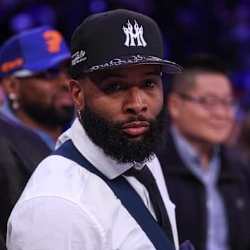 NFL wide receiver Odell Beckham Jr. sits courtside during the second half of the NBA game between the New York Knicks and the Phoenix Suns at Madison Square Garden. 