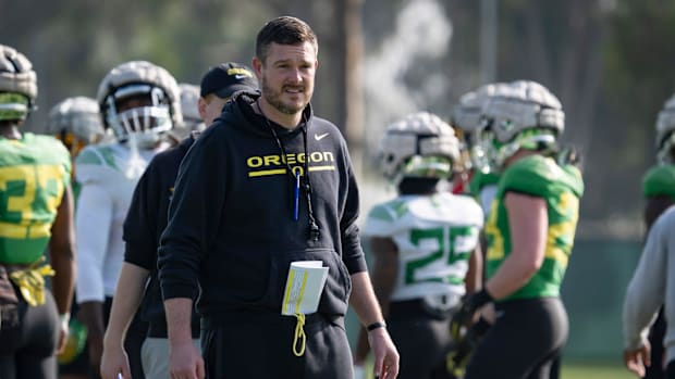 Oregon head coach Dan Lanning walks the field during open practice for the Oregon Ducks at the Dignity Health Sports Park in 