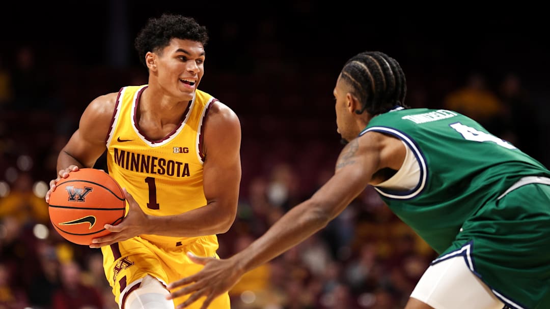 Nov 18, 2025; Minneapolis, Minnesota, USA; Minnesota Golden Gophers guard Isaac Asuma (1) controls the ball as Chicago State Cougars guard Marcus Tankersley (4) defends during the first half at Williams Arena. Mandatory Credit: Matt Krohn-Imagn Images Nov 18, 2025; Minneapolis, Minnesota, USA; Minnesota Golden Gophers guard Isaac Asuma (1) controls the ball as Chicago State Cougars guard Marcus Tankersley (4) defends during the first half at Williams Arena. Mandatory Credit: Matt Krohn-Imagn Images