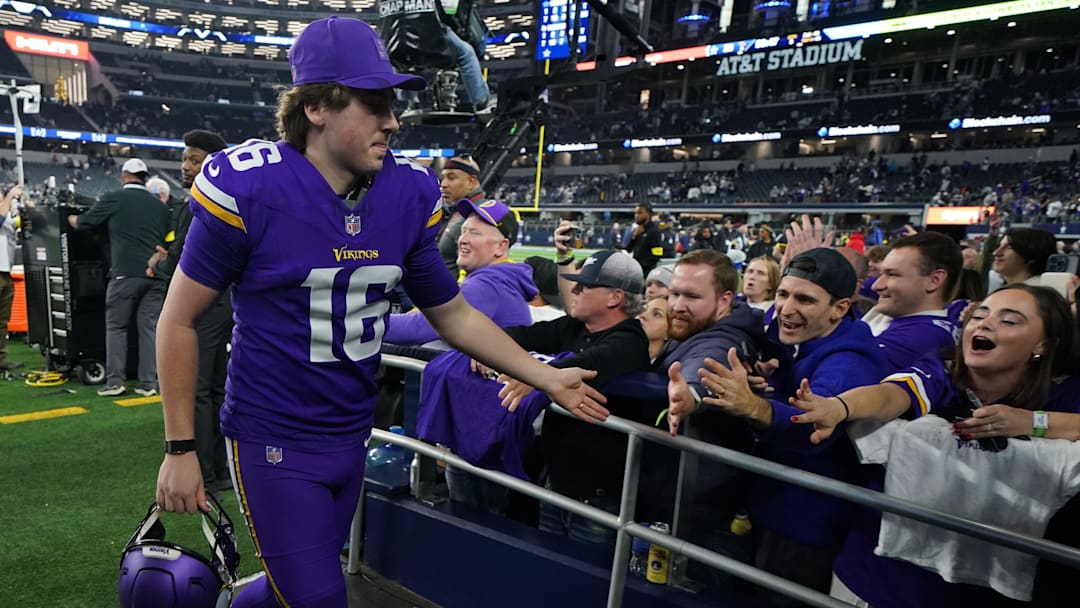 Dec 14, 2025; Arlington, Texas, USA; Minnesota Vikings place kicker Will Reichard (16) celebrates with fans after a game against the Dallas Cowboys at AT&T Stadium. Mandatory Credit: Raymond Carlin III-Imagn Images