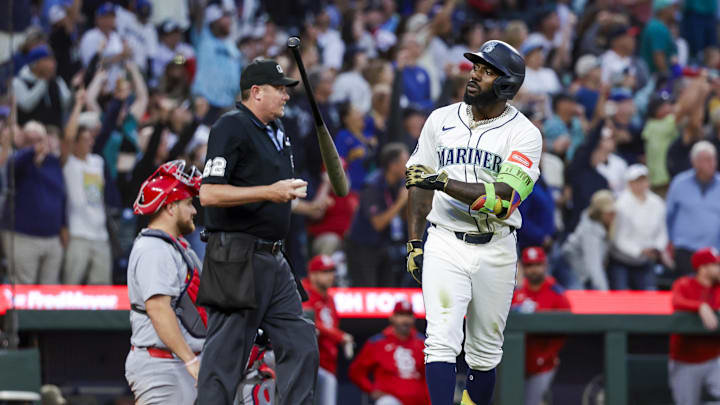 Sep 9, 2025; Seattle, Washington, USA; Seattle Mariners left fielder Randy Arozarena (56) reacts towards the Mariners dugout after hitting a three-run home run against the St. Louis Cardinals during the third inning at T-Mobile Park. Mandatory Credit: Joe Nicholson-Imagn Images