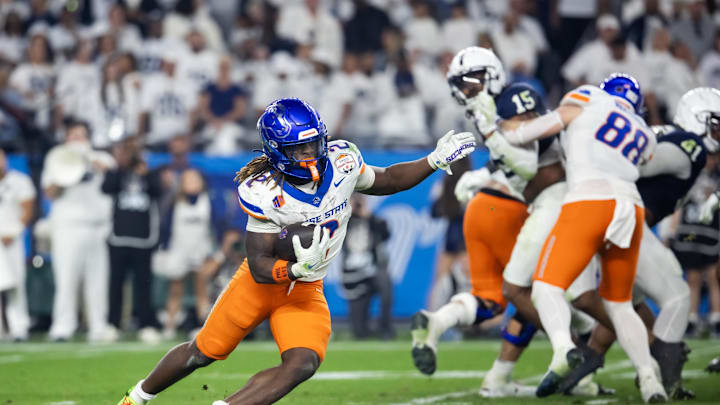 Boise State Broncos running back Ashton Jeanty against the Penn State Nittany Lions during the Fiesta Bowl at State Farm Stadium. Boise State Broncos running back Ashton Jeanty against the Penn State Nittany Lions during the Fiesta Bowl at State Farm Stadium.