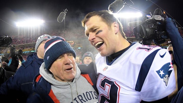 Former New England Patriots coach Bill Belichick and Tom Brady celebrate an AFC Championship win.