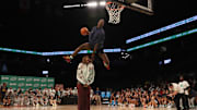 McDonald’s All American West forward AJ Dybantsa dunks the ball over Chicago Sky forward Angel Reese.
