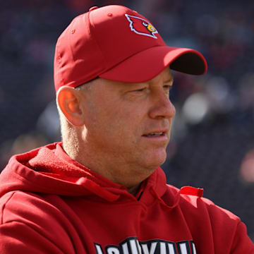 Louisville Cardinals head coach Jeff Brohm looks on before the game against the Virginia Tech Hokies at Lane Stadium.