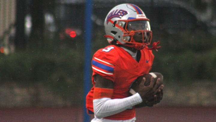 Bolles wide receiver Naeem Burroughs (3) fields a punt in drills before a high school football game against Raines on August 23, 2024. [Clayton Freeman/Florida Times-Union]