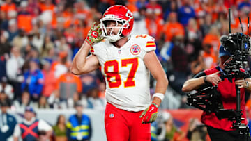 Nov 16, 2025; Denver, Colorado, USA; Kansas City Chiefs tight end Travis Kelce (87) reacts after his touchdown in the fourth quarter against the Denver Broncos at Empower Field at Mile High. 