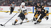 Mar 11, 2025; Pittsburgh, Pennsylvania, USA;  Vegas Golden Knights left wing Pavel Dorofeyev (16) moves the puck against Pittsburgh Penguins left wing Danton Heinen (43) during the second period at PPG Paints Arena. Mandatory Credit: Charles LeClaire-Imagn Images