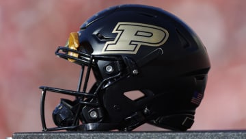 A Purdue Boilermakers helmet sits on the sidelines