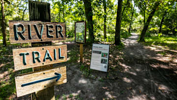 Signs easily mark the River Trail Tuesday afternoon, July 20, 2021. The trail is a 1.3 mile loop that starts near the Silver River Museum and ends up at the Silver River on the Silver Springs State Park. Silver Springs is part of the Florida Wildlife Corridor which includes 17.7 million acres of land across Florida that residents are encouraged to explore and conserve. About 43% of Marion County is included in the corridor, including the Ocala National Forest and many area springs. [Doug