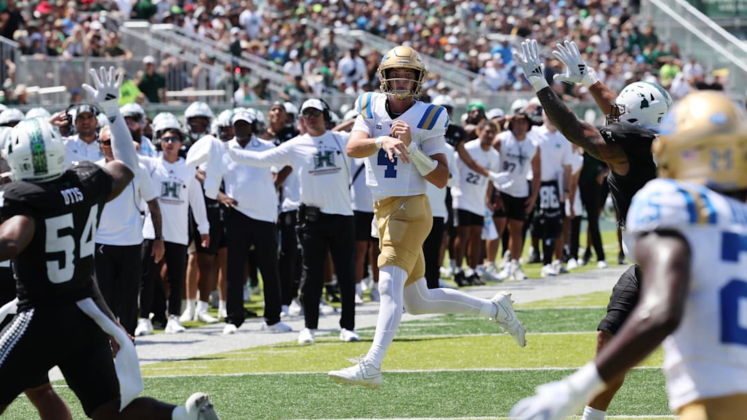 Aug 31, 2024; Honolulu, Hawaii, USA;  UCLA Bruins quarterback Ethan Garbers (4) throws an end zone  interception against the Hawaii Rainbow Warriors during the first quarter of an NCAA college football game at the Clarence T.C. Ching Athletics Complex. Mandatory Credit: Marco Garcia-Imagn Images