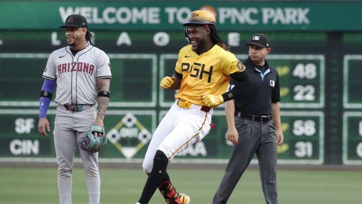 Aug 2, 2024; Pittsburgh, Pennsylvania, USA;  Pittsburgh Pirates shortstop Oneil Cruz (15) reacts at second base after hitting a double against the Arizona Diamondbacks during the first inning at PNC Park.