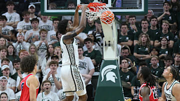 Nov 21, 2025; East Lansing, Michigan, USA;  Michigan State Spartans forward Cameron Ward (3) dunks the ball against the Detroit Mercy Titans during the first half at Jack Breslin Student Events Center. Mandatory Credit: Dale Young-Imagn Images
