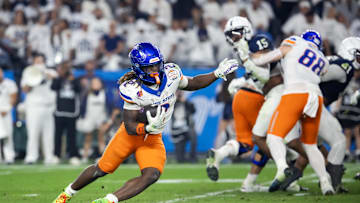 Dec 31, 2024; Glendale, AZ, USA; Boise State Broncos running back Ashton Jeanty (2) against the Penn State Nittany Lions during the Fiesta Bowl at State Farm Stadium. Mandatory Credit: Mark J. Rebilas-Imagn Images