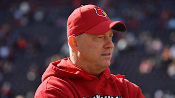 Nov 1, 2025; Blacksburg, Virginia, USA;  Louisville Cardinals head coach Jeff Brohm looks on before the game against the Virginia Tech Hokies at Lane Stadium. Mandatory Credit: Brian Bishop-Imagn Images