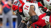Sep 11, 2025; Winston-Salem, North Carolina, USA;  North Carolina State Wolfpack offensive lineman Jalen Grant (74) snaps the ball against the Wake Forest Demon Deacons in the second half at Allegacy Federal Credit Union Stadium. Mandatory Credit: Luke Jamroz-Imagn Images