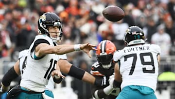 Dec 10, 2023; Cleveland, Ohio, USA; Jacksonville Jaguars quarterback Trevor Lawrence (16) throws a pass during the second half against the Cleveland Browns at Cleveland Browns Stadium. Mandatory Credit: Ken Blaze-Imagn Images