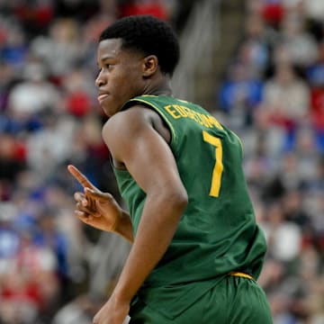 Mar 21, 2025; Raleigh, NC, USA; Baylor Bears guard VJ Edgecombe (7) celebrates during the second half against the Mississippi State Bulldogs in the first round of the NCAA Tournament at Lenovo Center. Mandatory Credit: Zachary Taft-Imagn Images