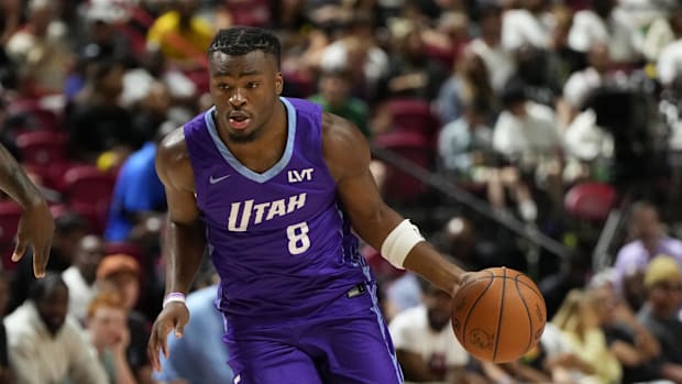 Jul 14, 2025; Las Vegas, NV, USA;  Utah Jazz guard Isaiah Collier (8) dribbles the ball against San Antonio Spurs forward Dav