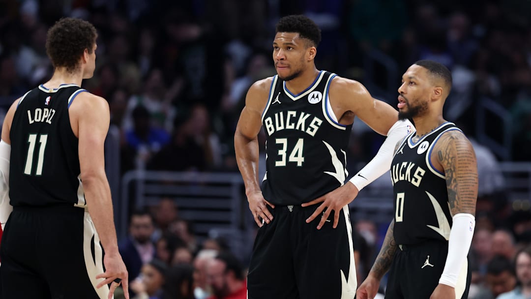 Mar 10, 2024; Los Angeles, California, USA;  Milwaukee Bucks center Brook Lopez (11) and forward Giannis Antetokounmpo (34) and guard Damian Lillard (0) on the court during the third quarter against the Los Angeles Clippers at Crypto.com Arena. Mandatory Credit: Kiyoshi Mio-Imagn Images